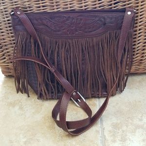 Leather purse with fringe and embossed detailing